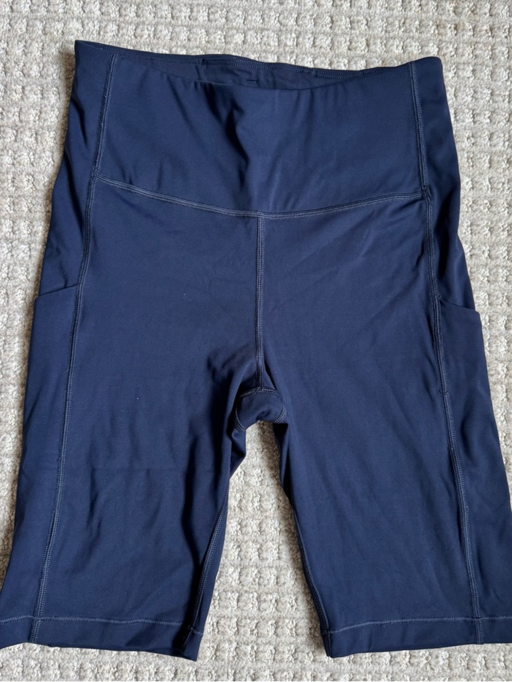 Athleta navy ultimate Stash Pocket 9”Bike Shorts